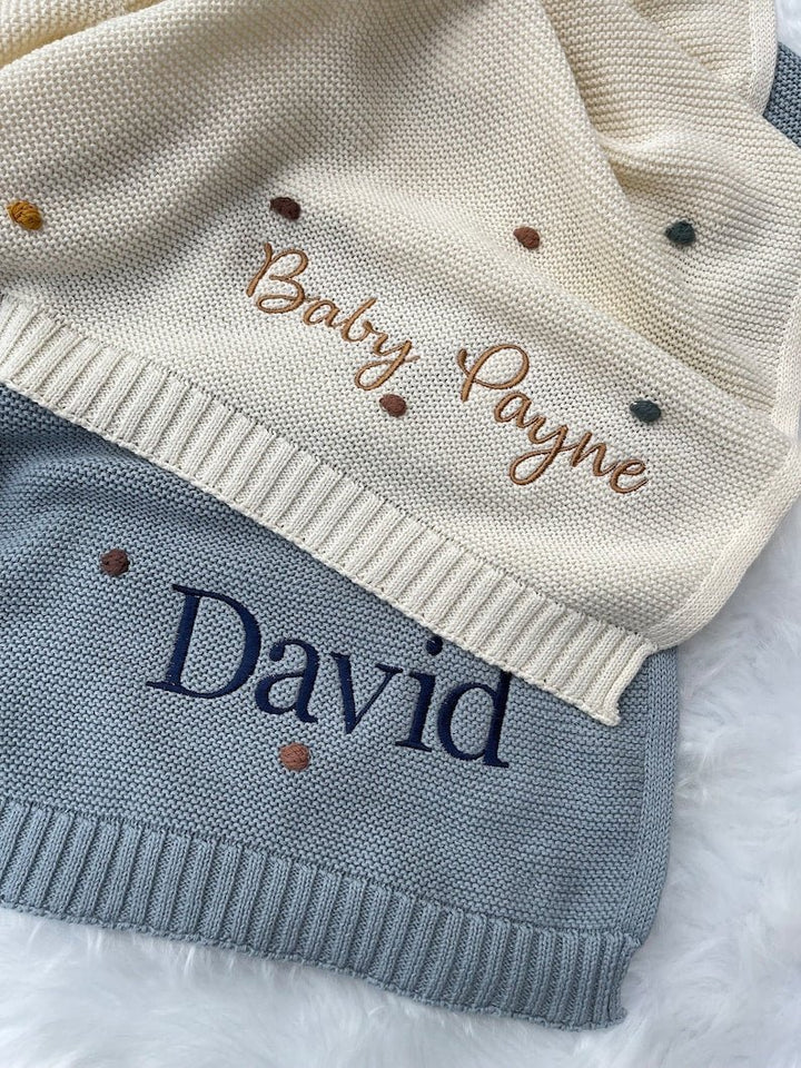 Embroidered knit baby blankets in cream and grey with personalised names Baby Payne and David