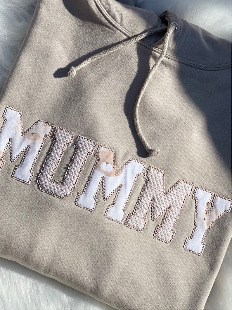 Ivory hoodie with bear applique “MUMMY” letters