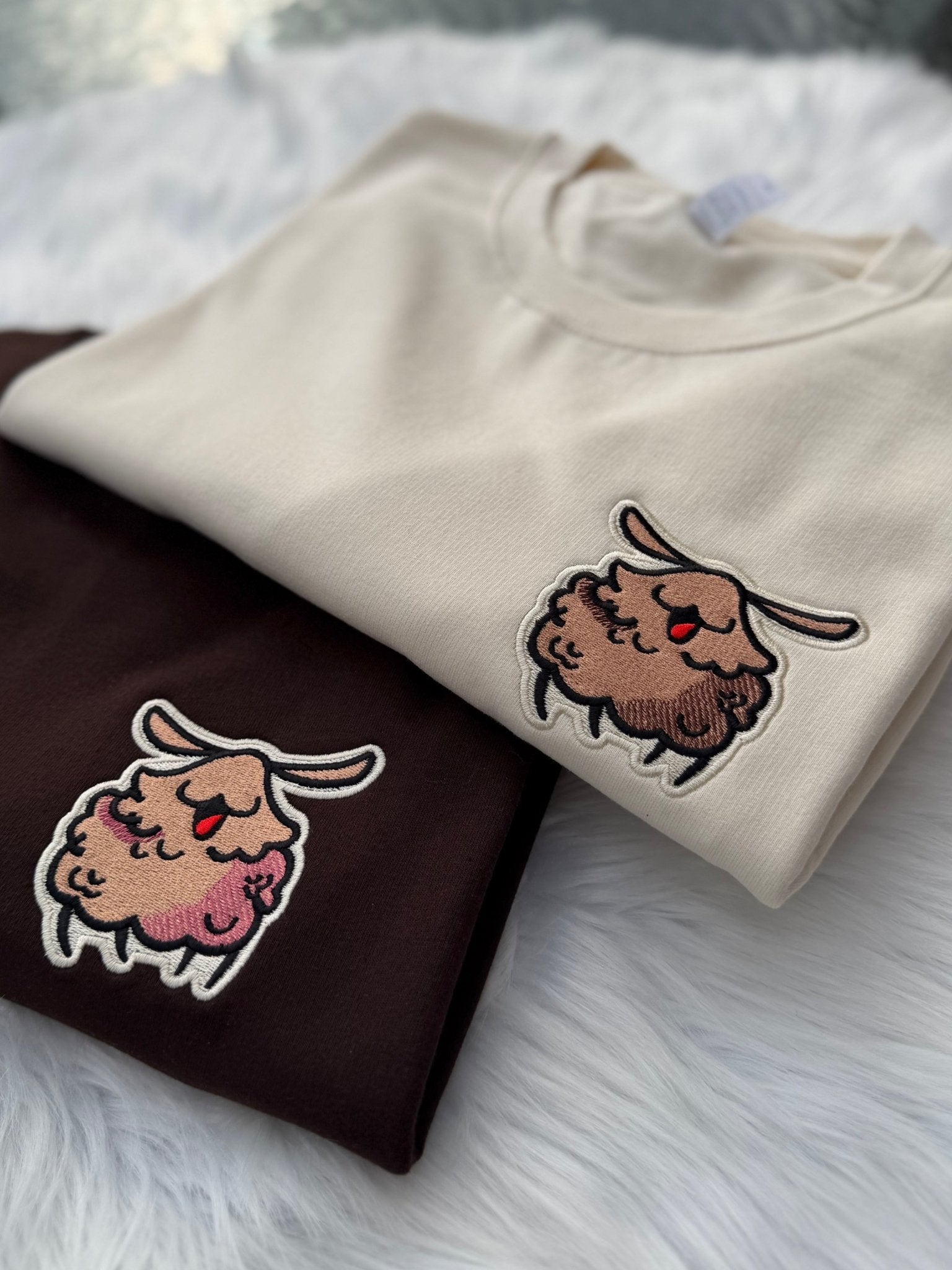 Milkshake and brown sweatshirts with Silksong Flea embroidery design